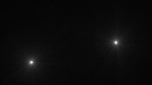 Paparazzi camera flashes, blinking flashlights animation on black background.Random bright blinking lights, Photography Flash.camera burst flash lights overlay paparazzi effect loop.