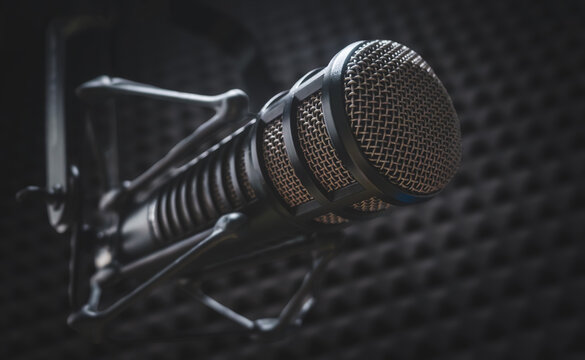 Background with a professional microphone and copy space