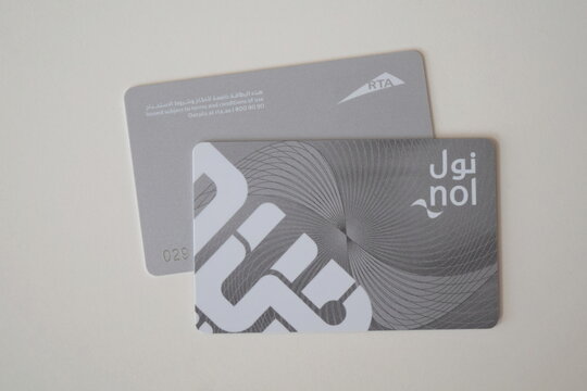 Two silver Nol contactless smart cards for Dubai public transport system placed on a clean white background.