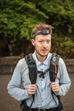 Tourist with headlamp and rucksack in the rainforest, Corcovado National Park, Osa Peninsula, Puntarena Province, Costa Rica