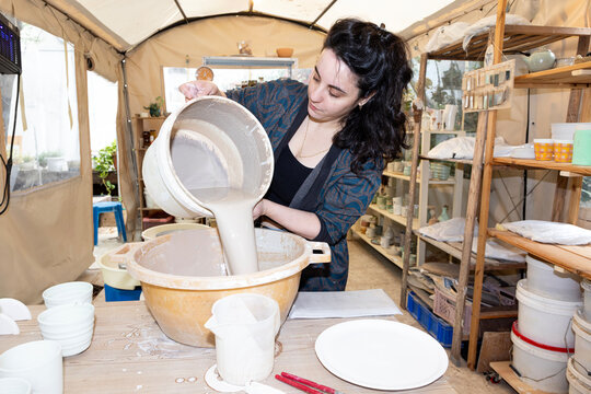 pouring glaze into large container