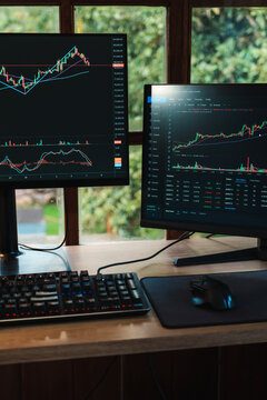 Trading Stock on Multiple Screens at professional trading home office