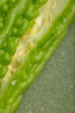 Bitter gourd on a green background