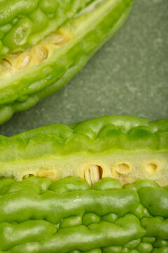 Bitter gourd on a green background