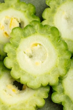 Bitter gourd on a green background