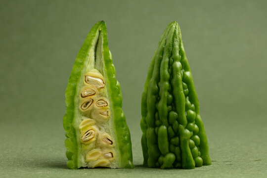 Bitter gourd on a green background