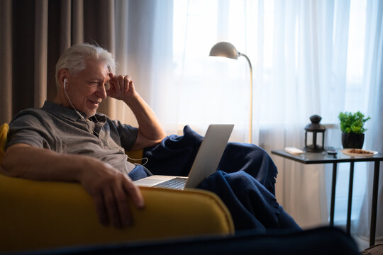 Senior man communicating with family online