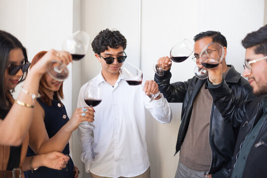 Groups of Young Friends Tasting Wine