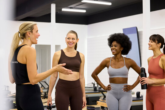 Women Doing Pilates in Class