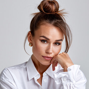 easy donut hair bun for any hair length with sexy facial expression, simple donut bun hairstyle tutorial with attractive woman portrait, elegant female portrait with easy hair bun styling for any hair