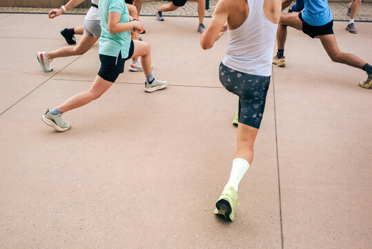 Runners stretch before an intense workout
