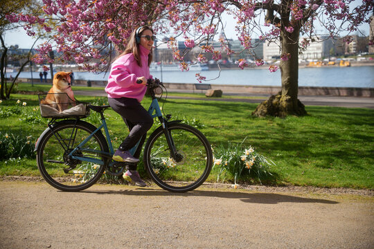 Woman on Bicycle ride with dog