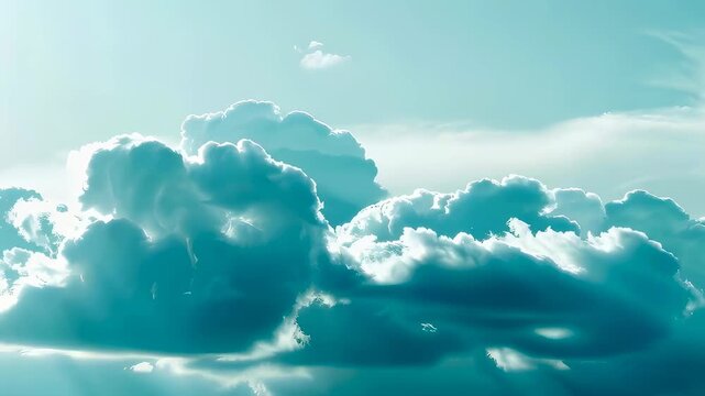 Fluffy white clouds floating in bright blue sky. Natural weather phenomenon observed from high altitude. Atmosphere and meteorological cloud formations during day.