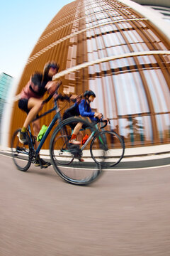 Women cycle together