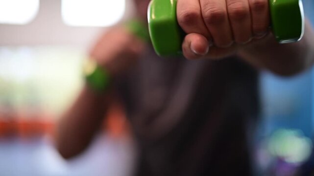 shadowboxing weights bokeh workout video abstract shallow depth of field view, working out, boxing with weights