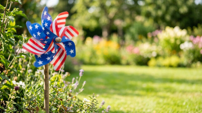 Patriotic pinwheel in garden during The Fourth of July, copy space