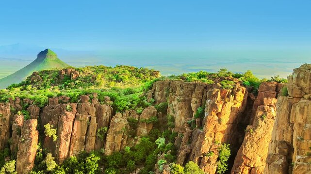Panorama of Camdeboo National Park Valley of Desolation, Karoo in Eastern Cape near the town of Graaff-Reinet, South Africa. Summer season. Blue sky. Banner with copy space.