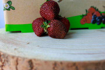 Fresh Ripe Strawberries Arranged on a Kitchen Table © Irina
