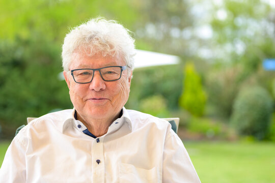 Smiling Senior Man Wearing Glasses