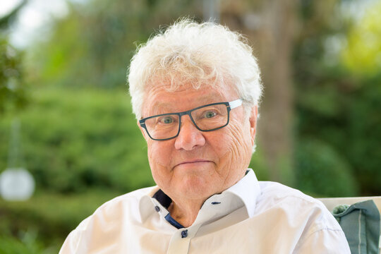 Cheerful Senior Man Wearing Glasses