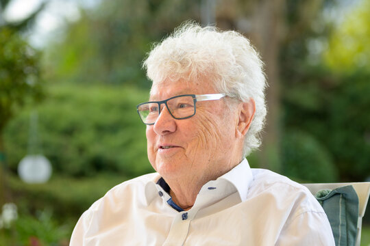 Senior Man Talking Outdoors Naturally
