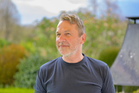 Mature Man Looking Into Distance