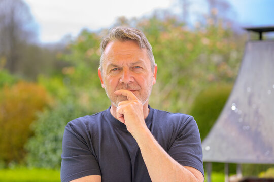 Thoughtful Mature Man Outdoor Portrait