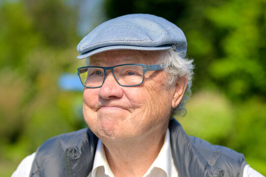 Reflective Elderly Man Outdoor Portrait