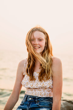 closeup of young woman on shore
