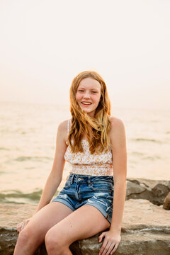 young woman on the beach shore
