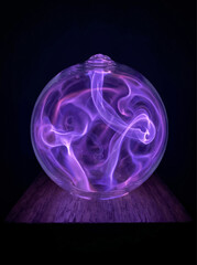 Fototapeta premium Futuristic Glass Sphere with Swirling Violet Smoke and Plasma