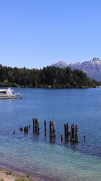 Scenic view of Lake Nahuel Huapi with snow capped mountains