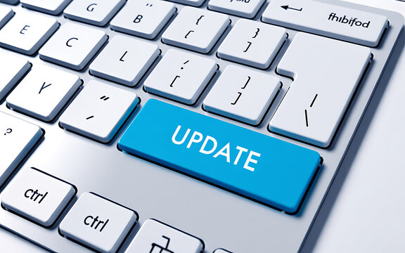 Close-up of computer keyboard with blue 'update' key button