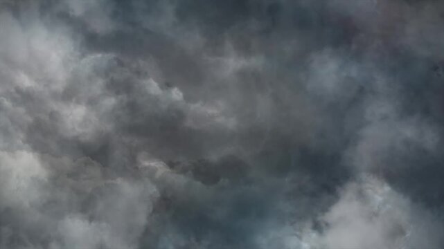 Lightning Flashes Inside Dark Storm Clouds