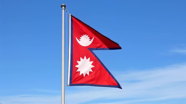 nepal nepalese flag waving in blue sky