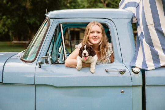 closeup of a woman in vintage truck