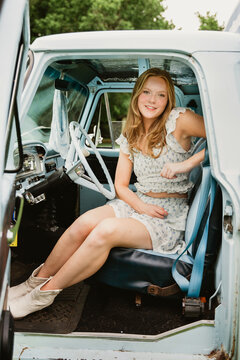 woman in vintage truck