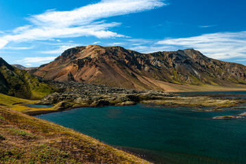 Naklejka premium Frostastaðavatn lake in Landmannalaugar Iceland surrounded by colorful rhyolite mountains and breathtaking Highland volcanic landscape