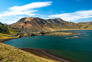 Naklejka premium Frostastaðavatn lake in Landmannalaugar Iceland surrounded by colorful rhyolite mountains and breathtaking Highland volcanic landscape