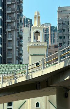 Urban landscape of a church amidst modern skyscrapers in the city