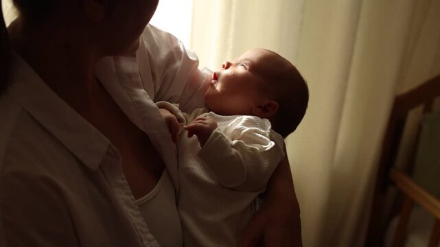 Mom and the newborn baby are at home.
