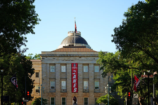 Raleigh, NC - USA - 6-20-2026: The North Carolina state capitol building with Carolina Hurricanes NHL Stanley Cup victory banner in downtown Raleigh