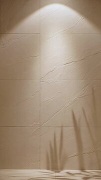 Natural plant shadow moving on a beige stone wall with a spotlight creating a serene and minimalist aesthetic perfect for spa, wellness, and beauty backgrounds