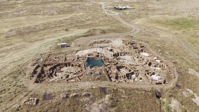 Cinematic Drone Flight Over Karahantepe Archaeological Site in Sanliurfa, Turkiye &ndash; Ancient Neolithic Heritage from Above