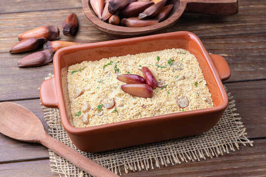 Fafora de pinh&atilde;o, typical brazilian sidedish on a bowl over wooden table