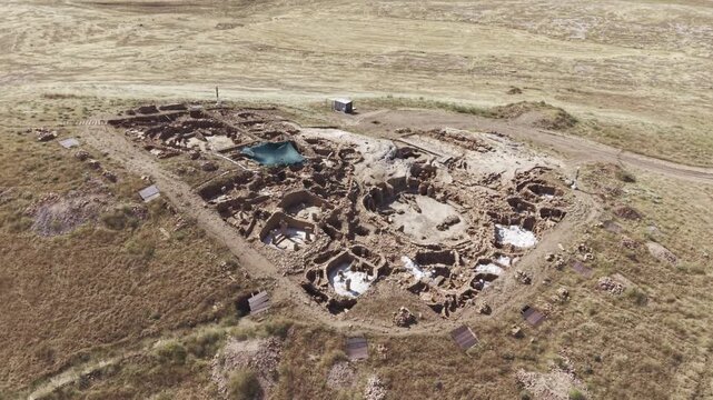 Cinematic Drone Flight Over Karahantepe Archaeological Site in Sanliurfa, Turkiye &ndash; Ancient Neolithic Heritage from Above