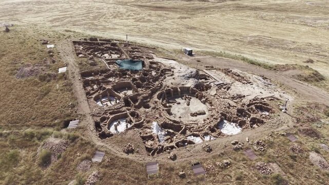 Cinematic Drone Flight Over Karahantepe Archaeological Site in Sanliurfa, Turkiye &ndash; Ancient Neolithic Heritage from Above