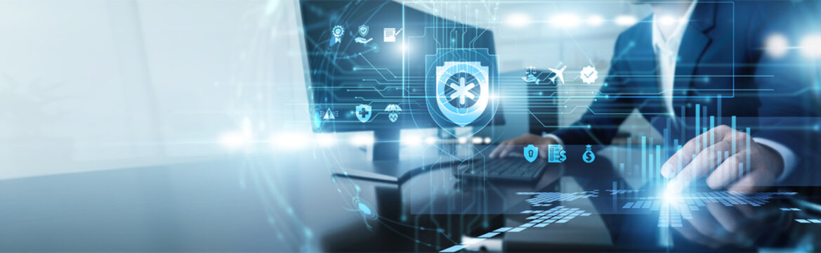 Fintech consultant working on computer for insurtech. Specialist implementing digital insurance solutions and data analytics to modernize legacy claims processing and policy management. Yes.