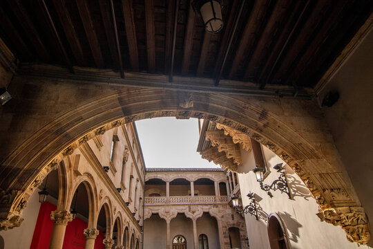 Architectural view through a stone arch in Palacio de la Salina, Salamanca