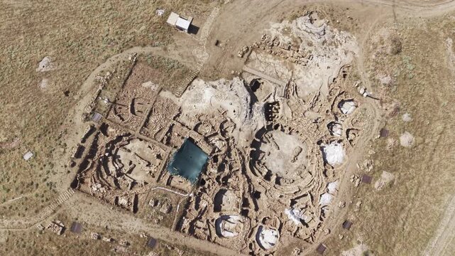 Cinematic Drone Flight Over Karahantepe Archaeological Site in Sanliurfa, Turkiye &ndash; Ancient Neolithic Heritage from Above